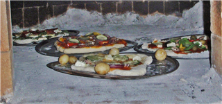 16. Pizzas in the oven to cook